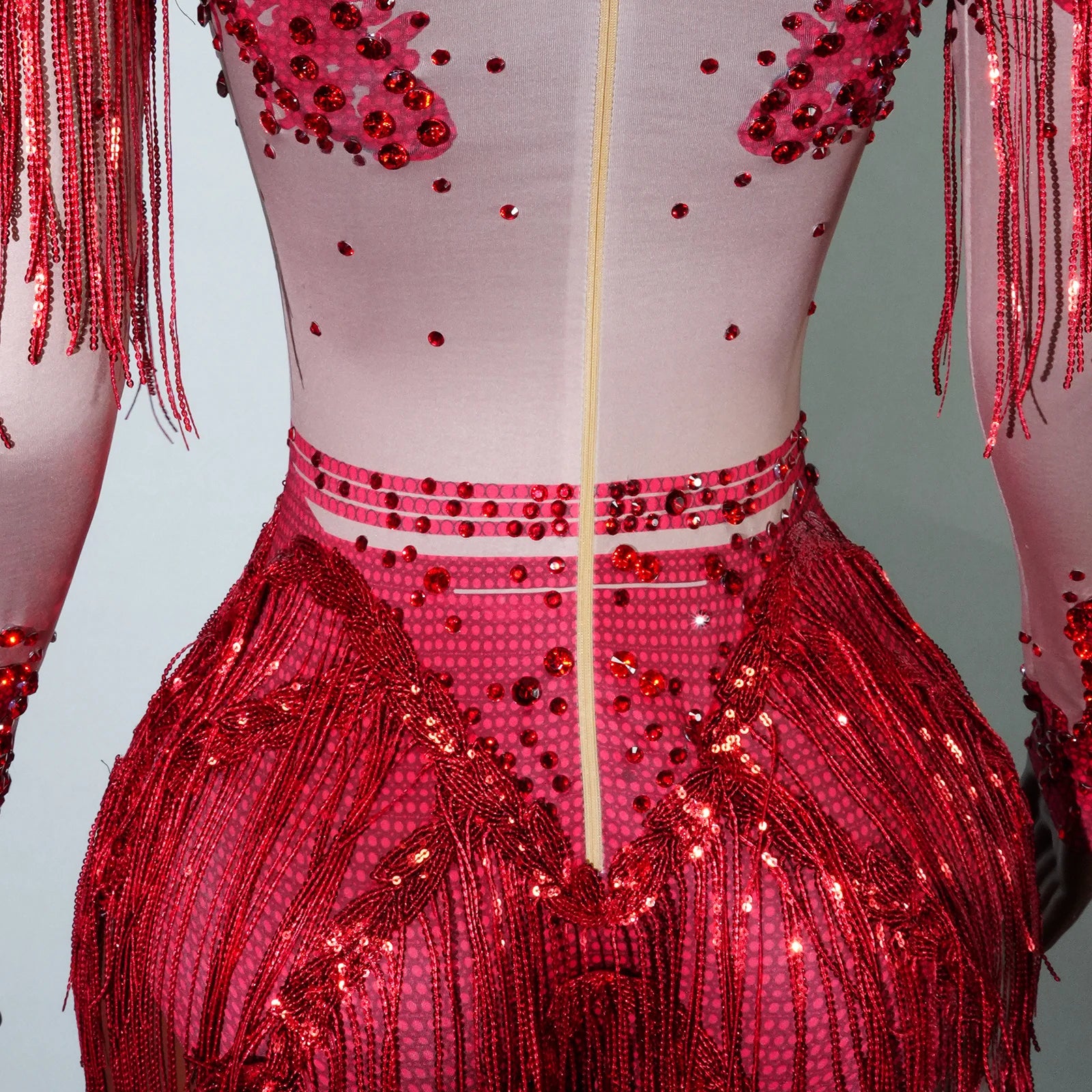 ChatGPT said:  Rhinestone Tassel Sequin Bodysuit Women Club Costume