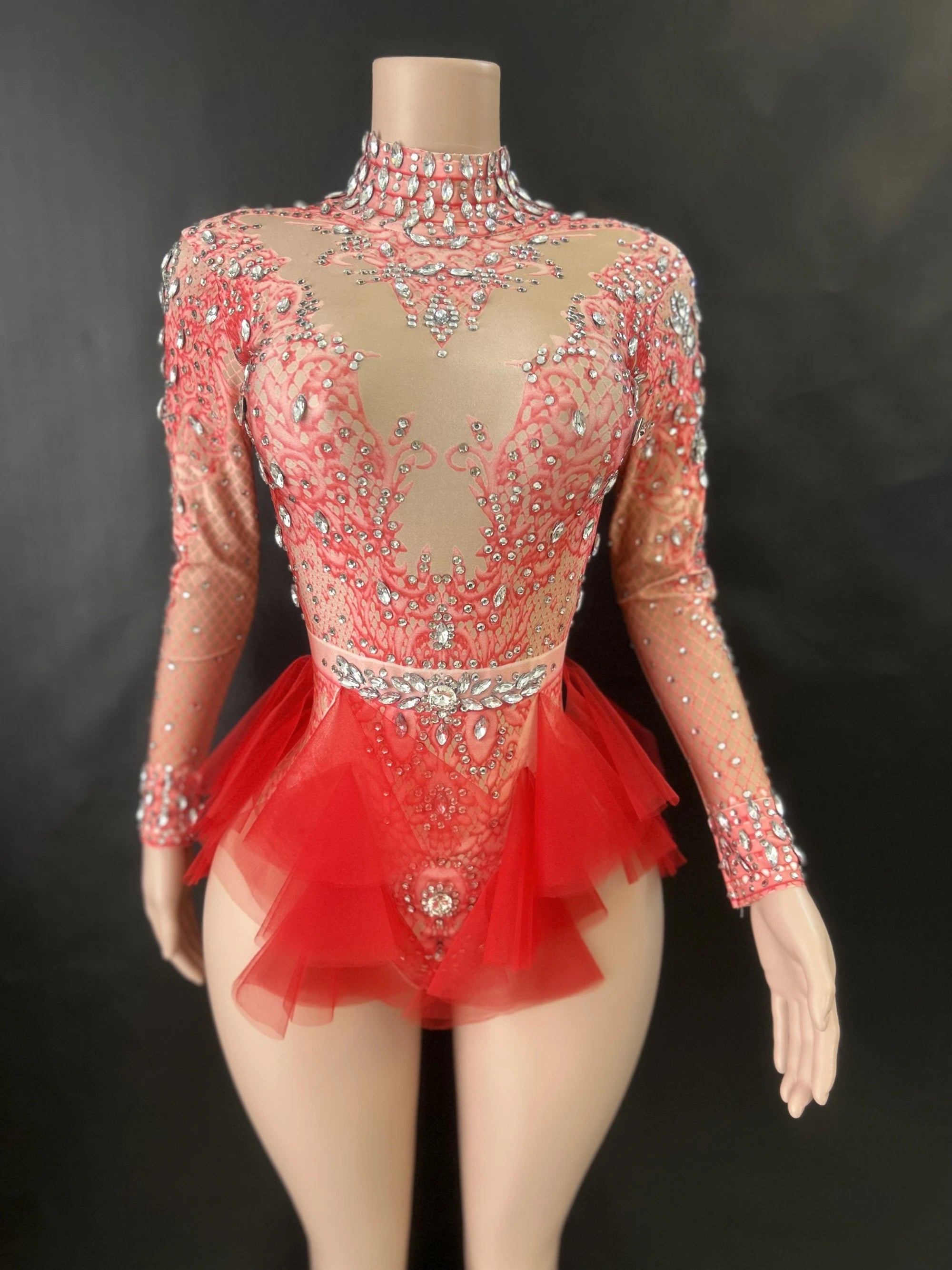 ChatGPT said:  Pink Mesh Rhinestone Ruffle Bodysuit Stage Outfit