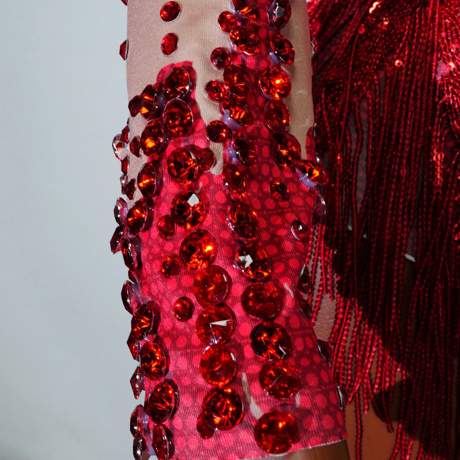 ChatGPT said:  Rhinestone Tassel Sequin Bodysuit Women Club Costume