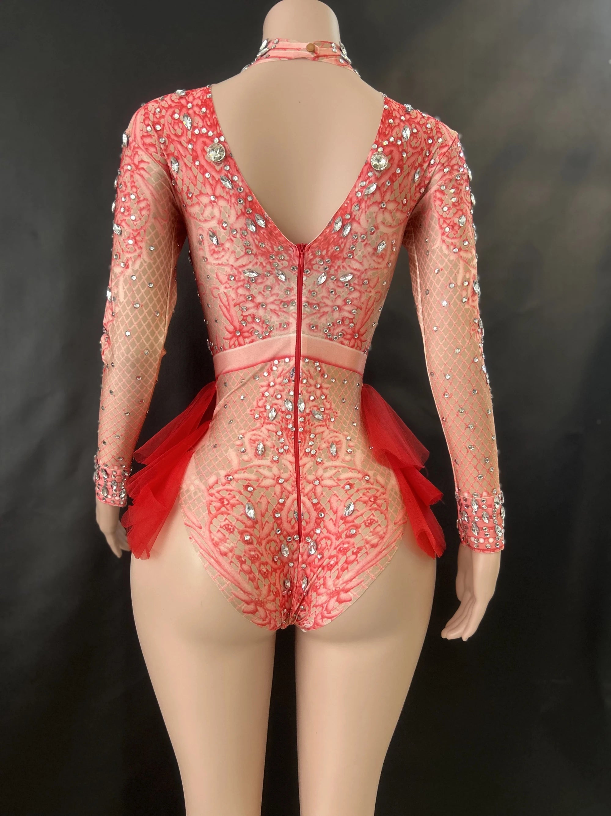 ChatGPT said:  Pink Mesh Rhinestone Ruffle Bodysuit Stage Outfit